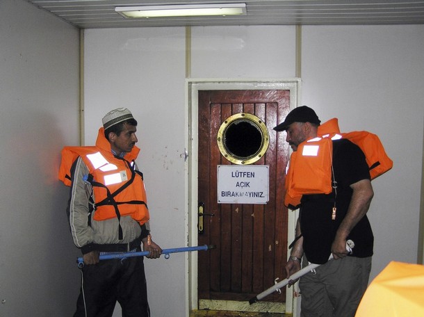 Pro-Palestinian activists are seen onboard the Gaza-bound Turkish ship Mavi Marmara