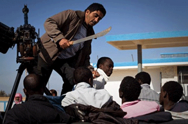 http://tundratabloids.com/wp-content/uploads/2011/09/libya-rebels-menace-africans-1103278.gif
