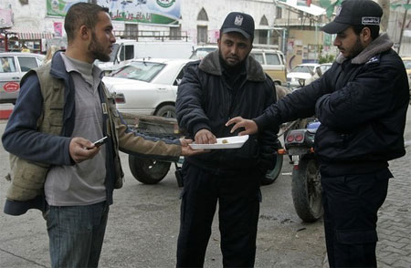 hamas hands out sweets after murder of fogel family