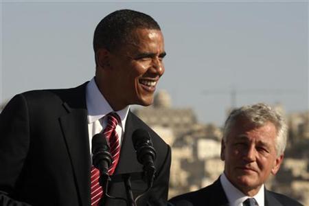 US Democratic presidential candidate Senator Obama smiles next to US Senator Hagel during news conference at the Amman Citadel