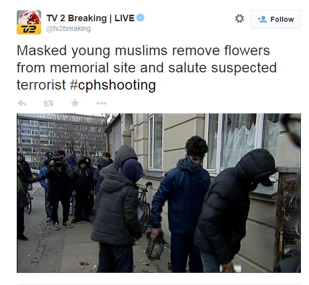 masked men remove flowers in copenhagen 17.2.2015