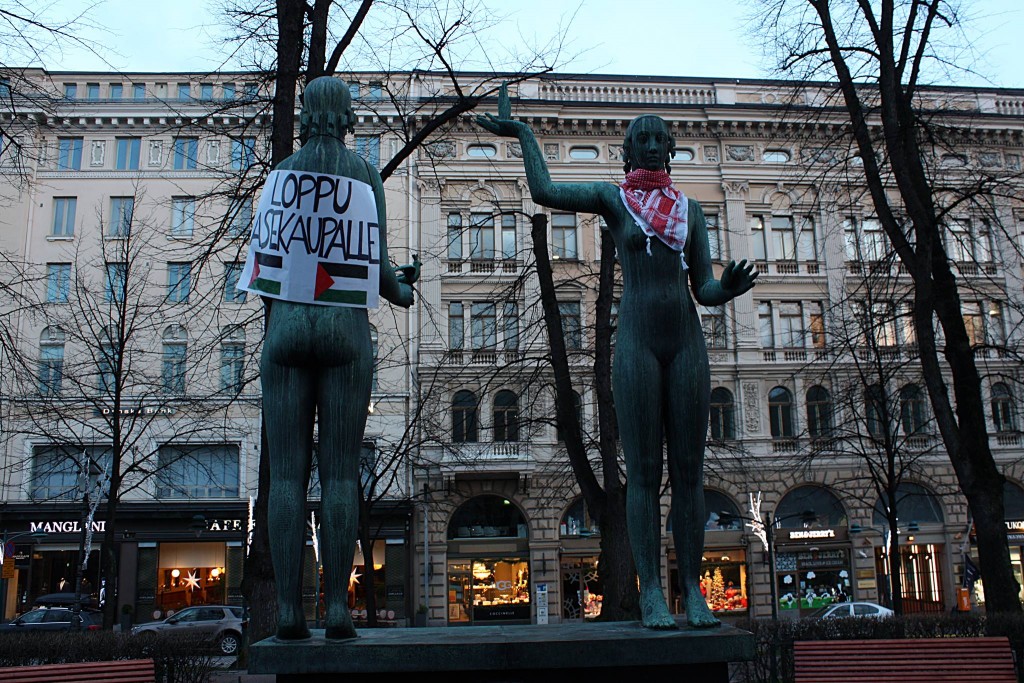 pali propaganda in helsinki statues dressup in islamonazi scarves7