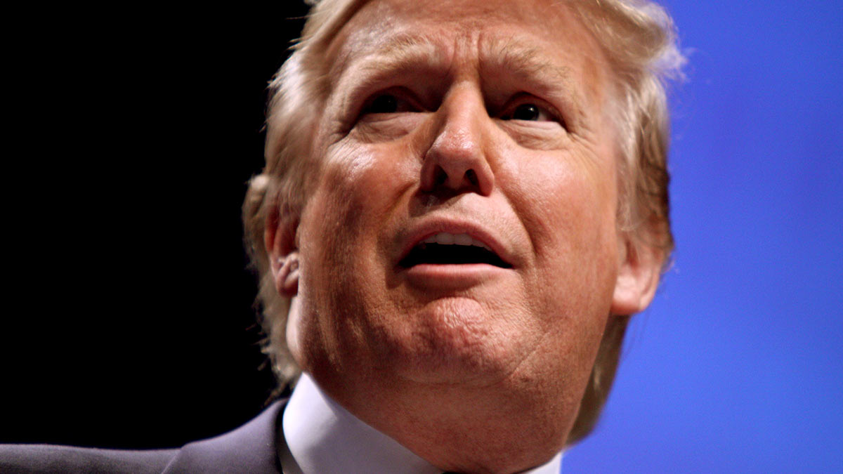 Donald Trump speaking at event.